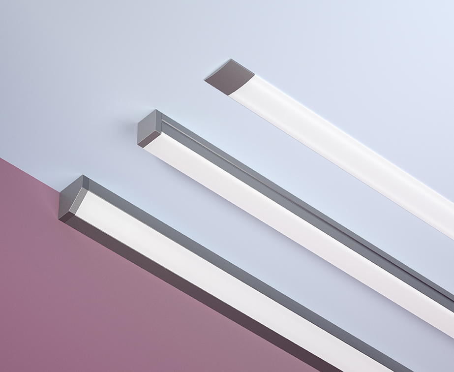 3 profili a LED della famiglia OPTIC: un profilo ultra sottile, un profilo rettangolare e un profilo angolare.